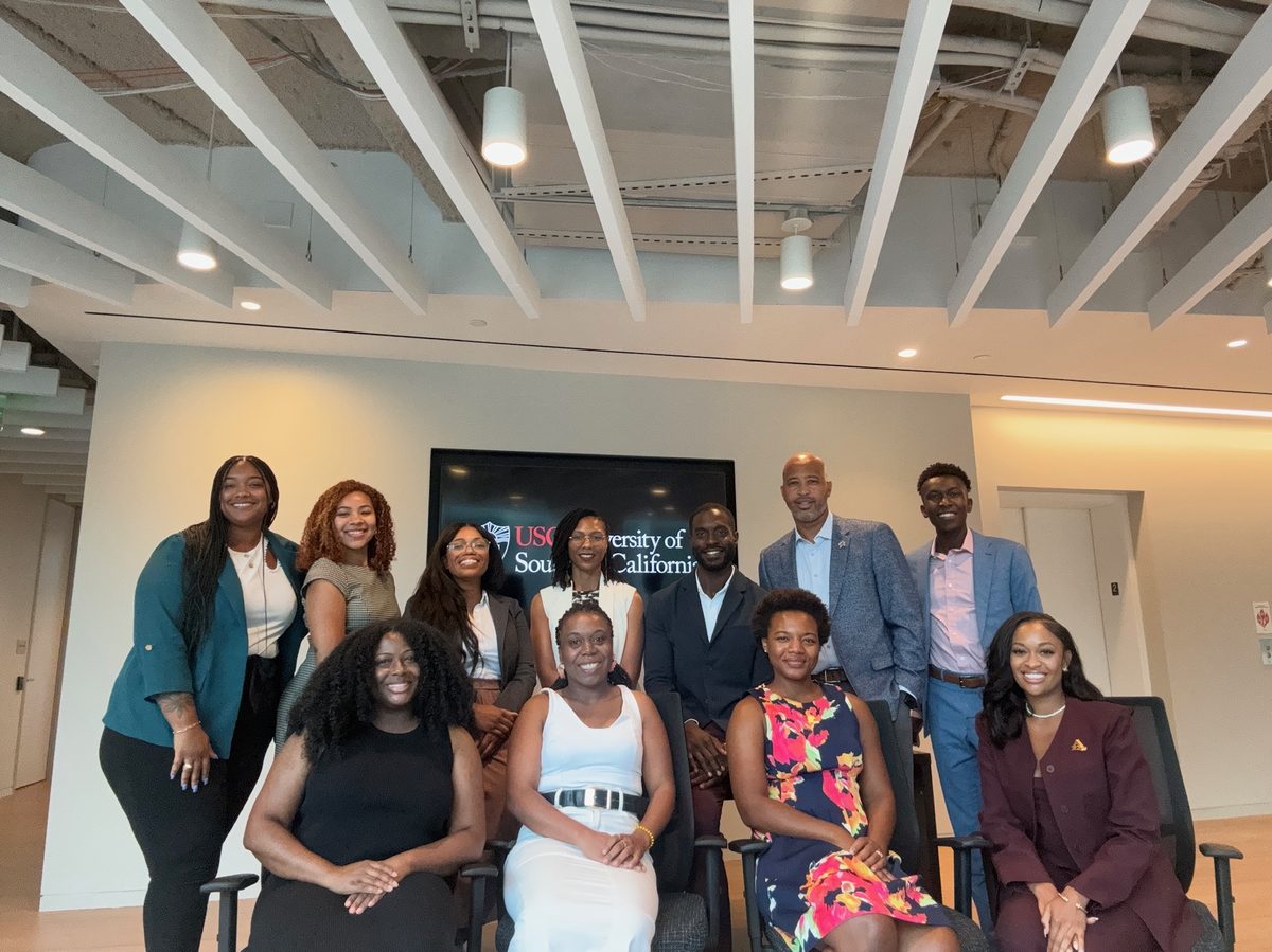 Collective members with Curtis Valentine at the USC Capital Campus.